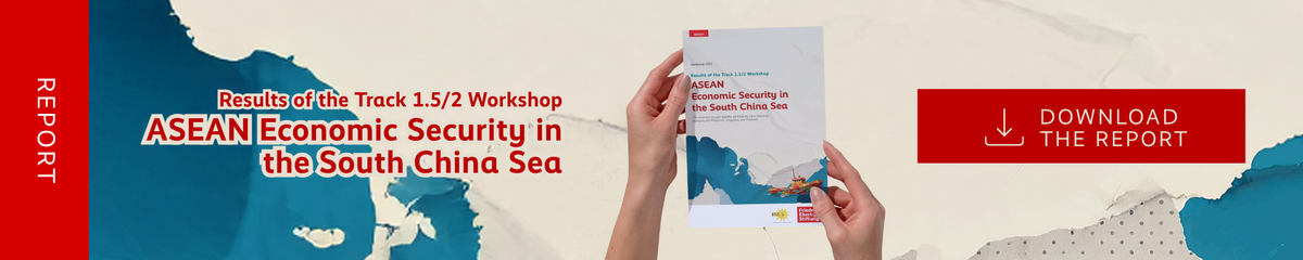 A horizontal banner with a dark red background on the left and a tan and blue abstract pattern on the right. The words "REPORT" and "Results of the Track 1.5/2 Workshop ASEAN Economic Security in the South China Sea" are written on the banner. In the center, a pair of hands holds up a report booklet. On the right, a dark red button with a download icon says "DOWNLOAD THE REPORT".